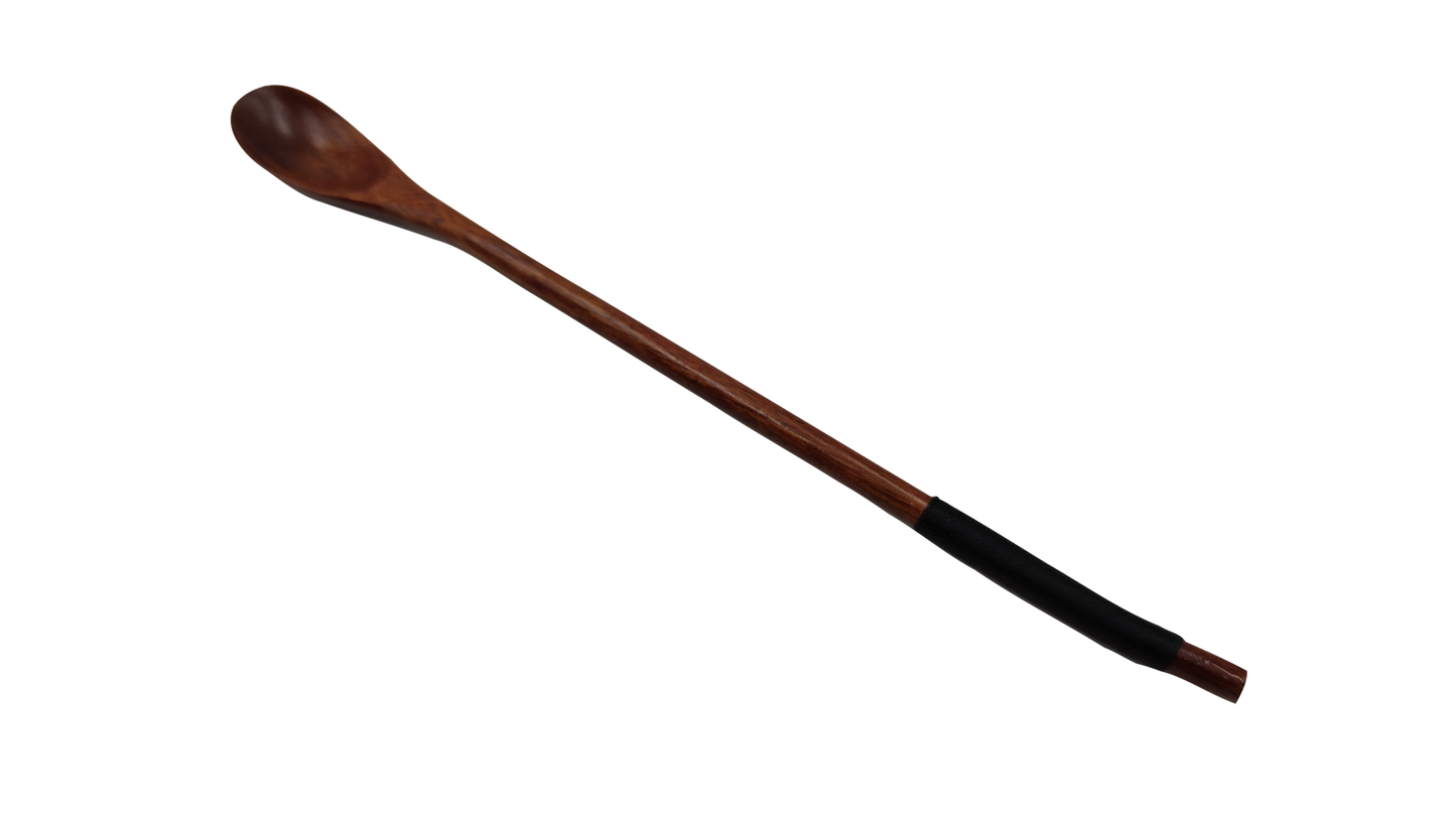 Long black wooden spoon